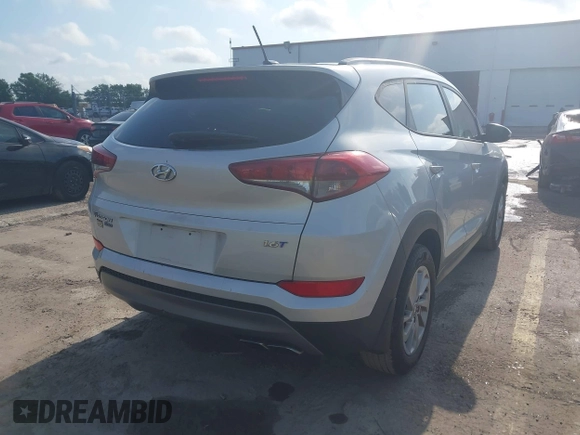 2016 Hyundai Tucson Limited with VIN KM8J33A25GU227907, listed as a IAAI auction lot 42211605 with 142,578 mi miles. Bid and sale history available at carsss.com. Image 4.