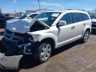 2014 Dodge Journey Limited with VIN 3C4PDCDG6ET105728, listed as a IAAI auction lot 41859746 with 184,335 mi miles. Bid and sale history available at carsss.com. Image 2.