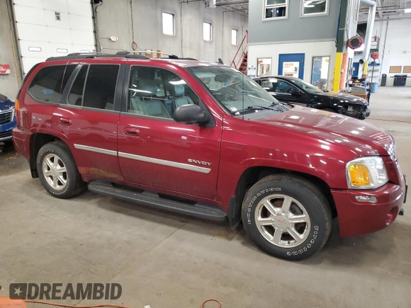 2006 GMC Envoy SLE with VIN 1GKDT13S062263876, listed as a Copart auction lot 60245185 with 156,567 mi miles and Clean title. Bid and sale history available at DreamBid. Image 4.