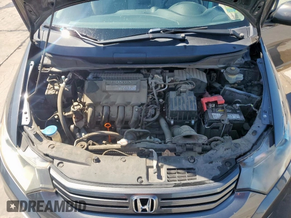 2010 Honda Insight LX with VIN JHMZE2H56AS042097, listed as a Copart auction lot 53972215 with 107,182 mi miles and Salvage Title. Bid and sale history available at DreamBid. Image 11.