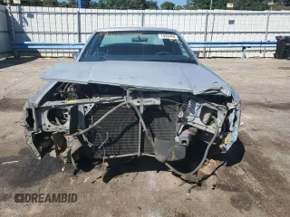 1989 Ford Crown Victoria z VIN 2FABP74F2KX141884, wystawiony jako Copart lot #74934494 z przebiegiem 84 761 mil mil oraz Szkoda całkowita • Salvage title. Historia ofert i sprzedaży dostępna na DreamBid. Obrazek 5.