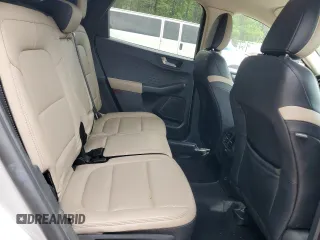 2020 Ford Escape SEL z VIN 1FMCU9H66LUB44403, wystawiony jako Copart lot #57934925 z przebiegiem Nie podano mil oraz Szkoda całkowita • Salvage title. Historia ofert i sprzedaży dostępna na DreamBid. Obrazek 11.