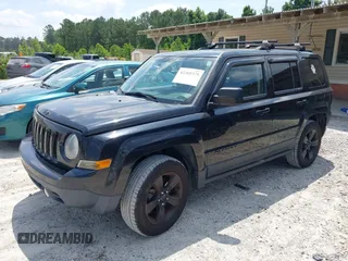 2015 Jeep Patriot Sport with VIN 1C4NJRBB2FD438977, listed as a IAAI auction lot 42305375 with 166,925 mi miles and . Bid and sale history available at DreamBid. Image 2.