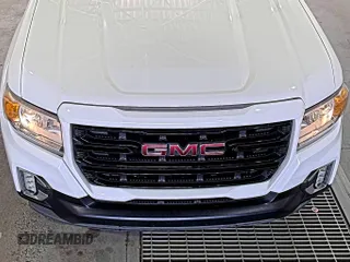 2021 GMC Canyon 2WD Elevation z VIN 1GTG5CEN5M1140499, wystawiony jako IAAI lot #42556124 z przebiegiem 41 450 mil mil oraz . Historia ofert i sprzedaży dostępna na DreamBid. Obrazek 20.