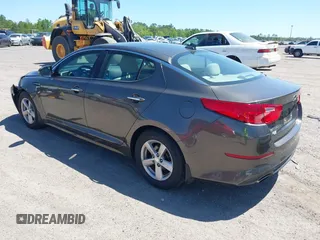 2014 Kia Optima LX with VIN 5XXGM4A71EG335165, listed as a IAAI auction lot 42052378 with 154,574 mi miles. Bid and sale history available at carsss.com. Image 3.