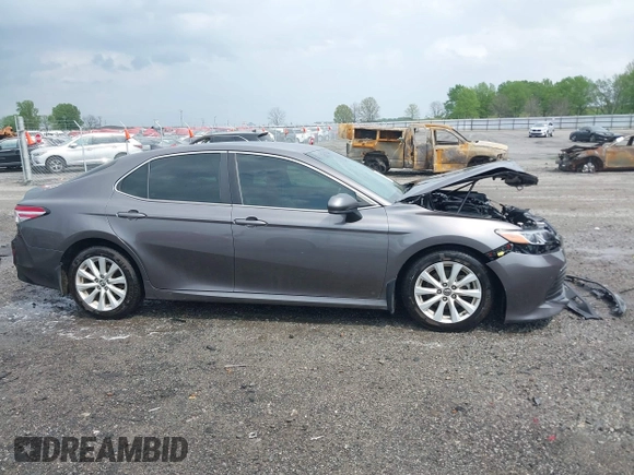 2020 Toyota Camry LE with VIN 4T1C11AK1LU328682, listed as a IAAI auction lot 41966816 with 172,334 mi miles and . Bid and sale history available at DreamBid. Image 13.