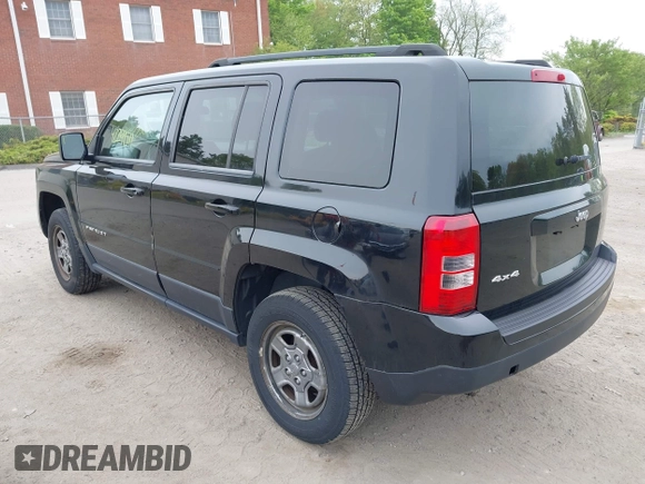 2014 Jeep Patriot Sport with VIN 1C4NJRBB3ED879757, listed as a IAAI auction lot 42241511 with 126,135 mi miles and . Bid and sale history available at carsss.com. Image 3.