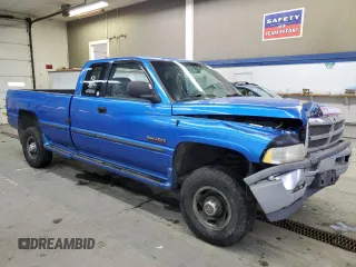 1999 Dodge Ram 2500 with VIN 1B7KF2363XJ608134, listed as a Copart auction lot 85928784 with 199,243 mi miles and Salvage Title. Bid and sale history available at carsss.com. Image 4.
