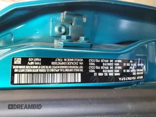 2022 Jeep Renegade Altitude z VIN ZACNJDE1XNPN73059, wystawiony jako Copart lot #56214685 z przebiegiem 56 666 mil mil oraz Szkoda całkowita • Salvage title. Historia ofert i sprzedaży dostępna na DreamBid. Obrazek 13.
