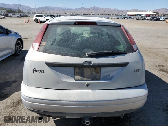 2000 Ford Focus ZX3 with VIN 3FAFP3132YR183435, listed as a Copart auction lot 60214034 with Not provided miles and Salvage title. Bid and sale history available at DreamBid. Image 6.