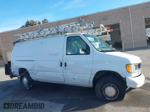 2000 Ford Econoline Cargo with VIN 1FTRE1427YHA09155, listed as a IAAI auction lot 41544236 with 32,275 mi miles. Bid and sale history available at carsss.com. Image 12.