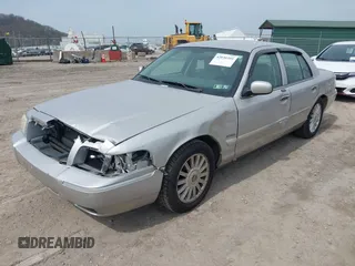 2010 Mercury Grand Marquis LS with VIN 2MEBM7FV6AX627666, listed as a IAAI auction lot 42030395 with 168,037 mi miles and . Bid and sale history available at DreamBid. Image 2.