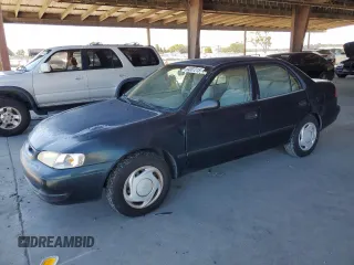 1999 Toyota Corolla VE with VIN 1NXBR12E6XZ286383, listed as a Copart auction lot 64007215 with 176,069 mi miles and Clean title. Bid and sale history available at DreamBid. Image 1.