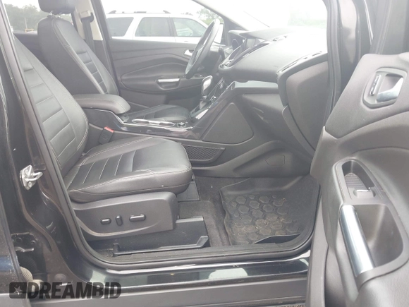 2015 Ford Escape Titanium z VIN 1FMCU0JX7FUB00462, wystawiony jako IAAI lot #42532943 z przebiegiem 88 623 mil mil oraz . Historia ofert i sprzedaży dostępna na DreamBid. Obrazek 5.