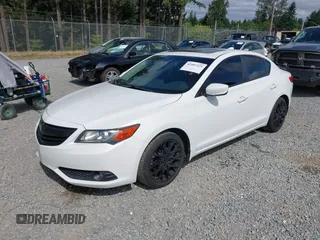 2014 Acura ILX Premium with VIN 19VDE1F54EE010386, listed as a IAAI auction lot 42587225 with 145,613 mi miles and . Bid and sale history available at DreamBid. Image 2.