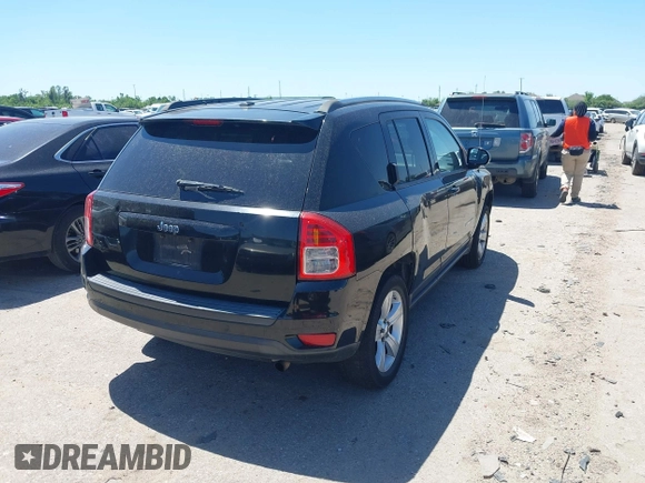 2012 Jeep Compass Sport with VIN 1C4NJCBA9CD684182, listed as a IAAI auction lot 41973857 with 216,722 mi miles. Bid and sale history available at carsss.com. Image 4.