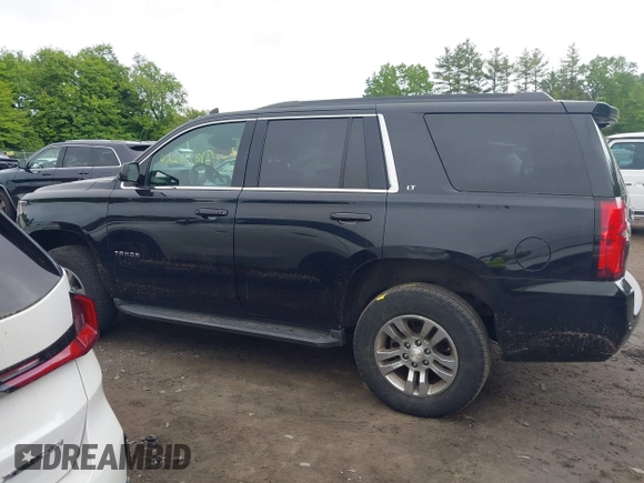 2017 Chevrolet Tahoe LT z VIN 1GNSKBKC3HR164976, wystawiony jako IAAI lot #42263818 z przebiegiem 99 261 mil mil oraz . Historia ofert i sprzedaży dostępna na DreamBid. Obrazek 14.