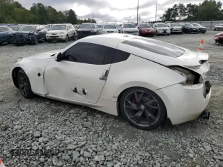 2013 Nissan 370Z with VIN JN1AZ4EH2DM381951, listed as a Copart auction lot 73913174 with 71,583 mi miles and Salvage Title. Bid and sale history available at carsss.com. Image 2.