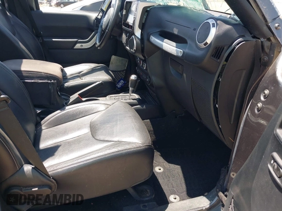 2016 Jeep Wrangler Unlimited Rubicon with VIN 1C4BJWFG7GL274673, listed as a IAAI auction lot 42532134 with 166,661 mi miles and . Bid and sale history available at DreamBid. Image 5.