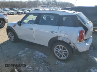 2016 MINI Countryman with VIN WMWZB3C58GWM33239, listed as a Copart auction lot 89364605 with 152,358 mi miles and Salvage title. Bid and sale history available at DreamBid. Image 2.