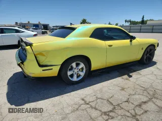 2021 Dodge Challenger R/T Scat Pack Widebody z VIN 2C3CDZFJ8MH594266, wystawiony jako Copart lot #56887575 z przebiegiem 28 748 mil mil oraz Szkoda całkowita • Salvage title. Historia ofert i sprzedaży dostępna na DreamBid. Obrazek 3.