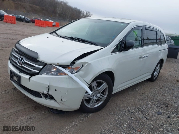 2013 Honda Odyssey Touring with VIN 5FNRL5H96DB089336, listed as a IAAI auction lot 41527990 with 128,770 mi miles. Bid and sale history available at carsss.com. Image 17.