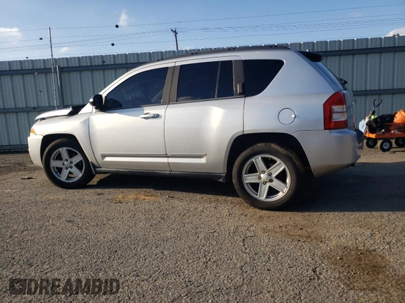 2010 Jeep Compass Sport with VIN 1J4NF4FB4AD513051, listed as a Copart auction lot 79667494 with 0 mi miles and Salvage Title. Bid and sale history available at carsss.com. Image 2.