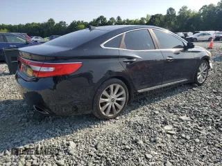 2013 Hyundai Azera с VIN KMHFH4JG2DA266282, выставлен на аукционе Copart как лот 59156175 с пробегом 135 013 миль миль и Списание • Salvage title. История ставок и продаж доступна на DreamBid. Изображение 3.