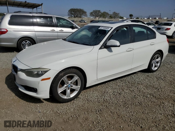 2015 BMW 3 Series 328i with VIN WBA3C1C51FP852825, listed as a Copart auction lot 53169305 with 184,383 mi miles and Salvage title. Bid and sale history available at DreamBid. Image 1.