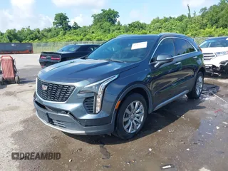 2021 Cadillac XT4 FWD Premium Luxury with VIN 1GYFZCR42MF007617, listed as a IAAI auction lot 42437974 with 126,071 mi miles and . Bid and sale history available at DreamBid. Image 2.