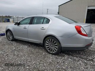 2013 Lincoln MKS with VIN 1LNHL9DK1DG604272, listed as a Copart auction lot 52880255 with 132,768 mi miles and Clean title. Bid and sale history available at DreamBid. Image 2.