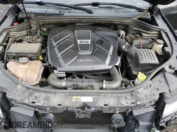 2014 Jeep Grand Cherokee Summit с VIN 1C4RJFJM2EC302534, выставлен на аукционе Copart как лот 61660155 с пробегом 206 823 миль миль и Списание • Salvage title. История ставок и продаж доступна на DreamBid. Изображение 12.