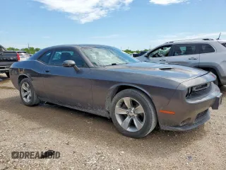 2016 Dodge Challenger SXT with VIN 2C3CDZAGXGH265147, listed as a Copart auction lot 59599185 with 83,671 mi miles and Salvage title. Bid and sale history available at DreamBid. Image 4.