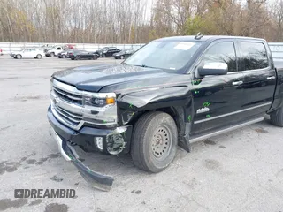 2016 Chevrolet Silverado 1500 High Country with VIN 3GCUKTEC2GG344953, listed as a IAAI auction lot 40700121 with 107,623 mi miles and . Bid and sale history available at DreamBid. Image 6.