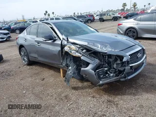 2020 Infiniti Q50 Red Sport 400 with VIN JN1FV7AP9LM630132, listed as a IAAI auction lot 41794185 with 20,049 mi miles and . Bid and sale history available at carsss.com. Image 1.