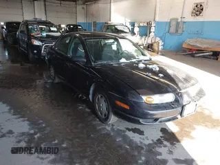 2000 Saturn SL with VIN 1G8ZH5282YZ214070, listed as a IAAI auction lot 41537546 with 94,319 mi miles. Bid and sale history available at carsss.com. Image 1.