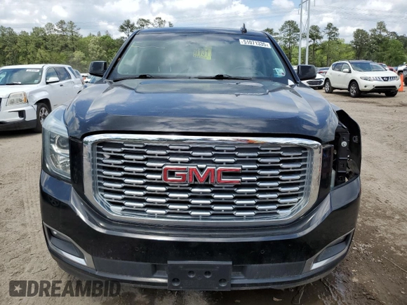 2019 GMC Yukon Denali with VIN 1GKS1CKJ0KR259491, listed as a Copart auction lot 51071335 with 105,294 mi miles and Salvage Title. Bid and sale history available at carsss.com. Image 5.