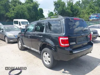 2011 Ford Escape XLT z VIN 1FMCU9D71BKA12061, wystawiony jako IAAI lot #42635447 z przebiegiem 195 433 mil mil oraz . Historia ofert i sprzedaży dostępna na DreamBid. Obrazek 3.