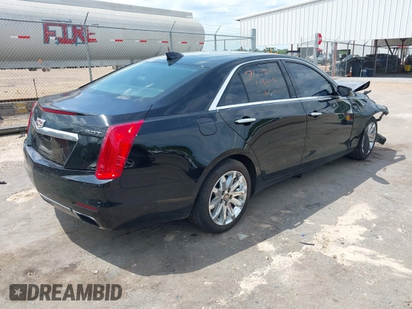 2016 Cadillac CTS AWD with VIN 1G6AW5SX7G0129019, listed as a IAAI auction lot 42148335 with 86,023 mi miles and . Bid and sale history available at DreamBid. Image 4.