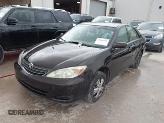 2002 Toyota Camry LE z VIN JTDBE32K720119418, wystawiony jako IAAI lot #42360721 z przebiegiem 235 678 mil mil oraz . Historia ofert i sprzedaży dostępna na DreamBid. Obrazek 2.