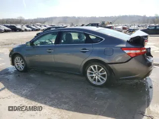 2013 Toyota Avalon XLE with VIN 4T1BK1EB6DU013820, listed as a Copart auction lot 50598635 with 165,466 mi miles and Salvage Title. Bid and sale history available at DreamBid. Image 2.