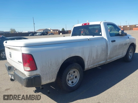 2015 Ram 1500 Tradesman with VIN 3C6JR7DT7FG584979, listed as a IAAI auction lot 41886286 with 60,982 mi miles and . Bid and sale history available at DreamBid. Image 4.