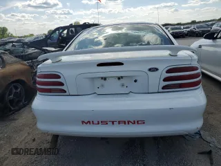 1995 Ford Mustang z VIN 1FALP4043SF252513, wystawiony jako Copart lot #52131605 z przebiegiem 237 066 mil mil oraz Szkoda całkowita • Salvage title. Historia ofert i sprzedaży dostępna na DreamBid. Obrazek 6.