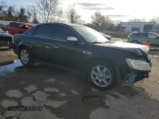 2008 Ford Taurus Limited with VIN 1FAHP25W38G181594, listed as a Copart auction lot 79701014 with 129,968 mi miles and Salvage Title. Bid and sale history available at carsss.com. Image 4.