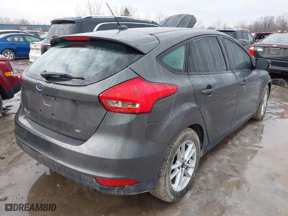 2015 Ford Focus SE with VIN 1FADP3K2XFL372066, listed as a IAAI auction lot 41460486 with 120012 miles. Bid and sale history available at carsss.com. Image 4.