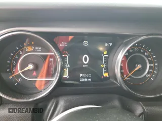 2023 Jeep Wrangler Sport with VIN 1C4HJXDG5PW527992, listed as a Copart auction lot 73312234 with 32,686 mi miles and Salvage Title. Bid and sale history available at DreamBid. Image 9.