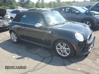 2013 MINI Convertible z VIN WMWZN3C54DT568237, wystawiony jako Copart lot #72354594 z przebiegiem 141 058 mil mil oraz Szkoda całkowita • Salvage title. Historia ofert i sprzedaży dostępna na DreamBid. Obrazek 4.