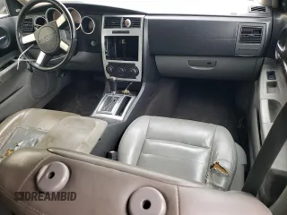 2006 Dodge Magnum R/T z VIN 2D4GV57236H361041, wystawiony jako Copart lot #84089424 z przebiegiem Nie podano mil oraz Szkoda całkowita • Salvage title. Historia ofert i sprzedaży dostępna na DreamBid. Obrazek 8.