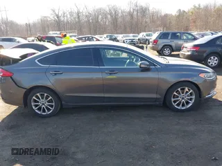 2017 Ford Fusion SE z VIN 3FA6P0HDXHR321008, wystawiony jako IAAI lot #41620779 z przebiegiem 110 116 mil mil oraz . Historia ofert i sprzedaży dostępna na DreamBid. Obrazek 13.
