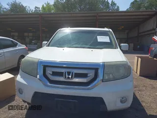 2011 Honda Pilot EX-L with VIN 5FNYF3H64BB027265, listed as a IAAI auction lot 41901424 with 198,556 mi miles and . Bid and sale history available at DreamBid. Image 12.